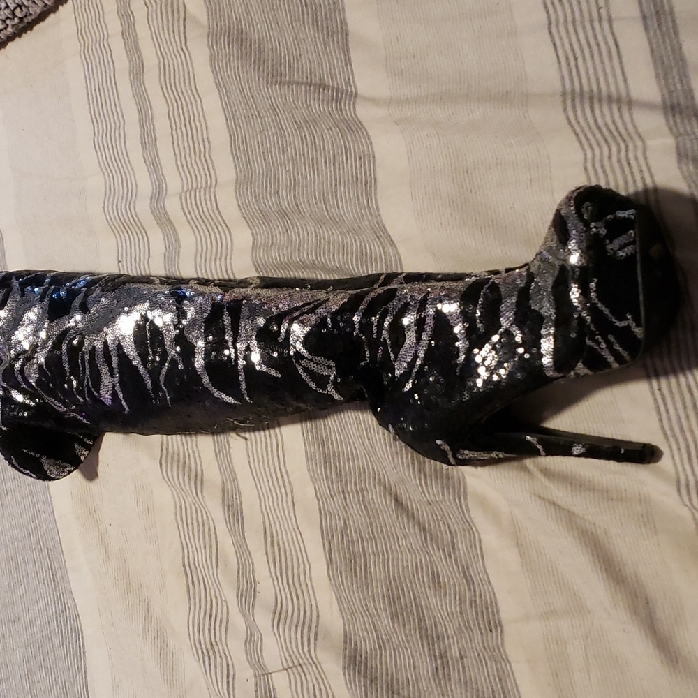 Over the knee sequence zebra Beyonce boots,the inside piling is a little worn bu